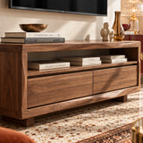 Sleek TV console in natural solid wood with walnut tone finish and drawers below