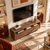 This television stand in natural solid wood has walnut tone finish and storage below