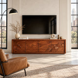 Entertainment center in solid wood with hand-carved ocean waves and mountain details

