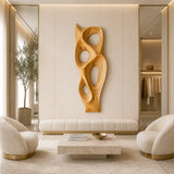 Decorative wall panel with four hollow forms brings texture to a calm modern home setting
