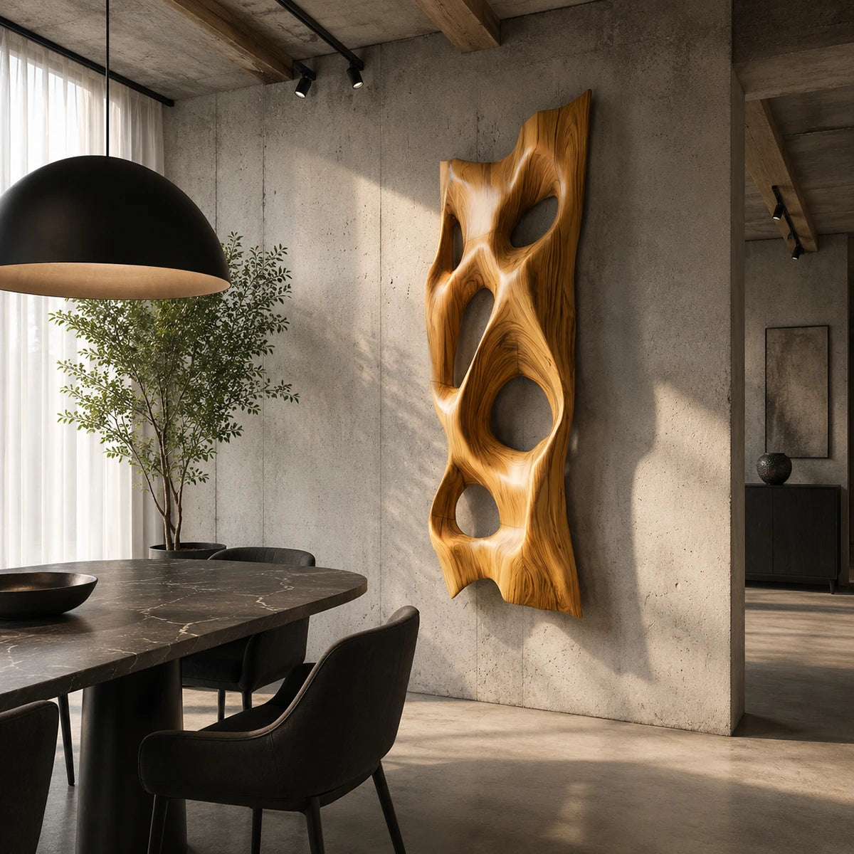 Modern wall sculpture with sweeping cutouts brings artistic depth to a spacious interior