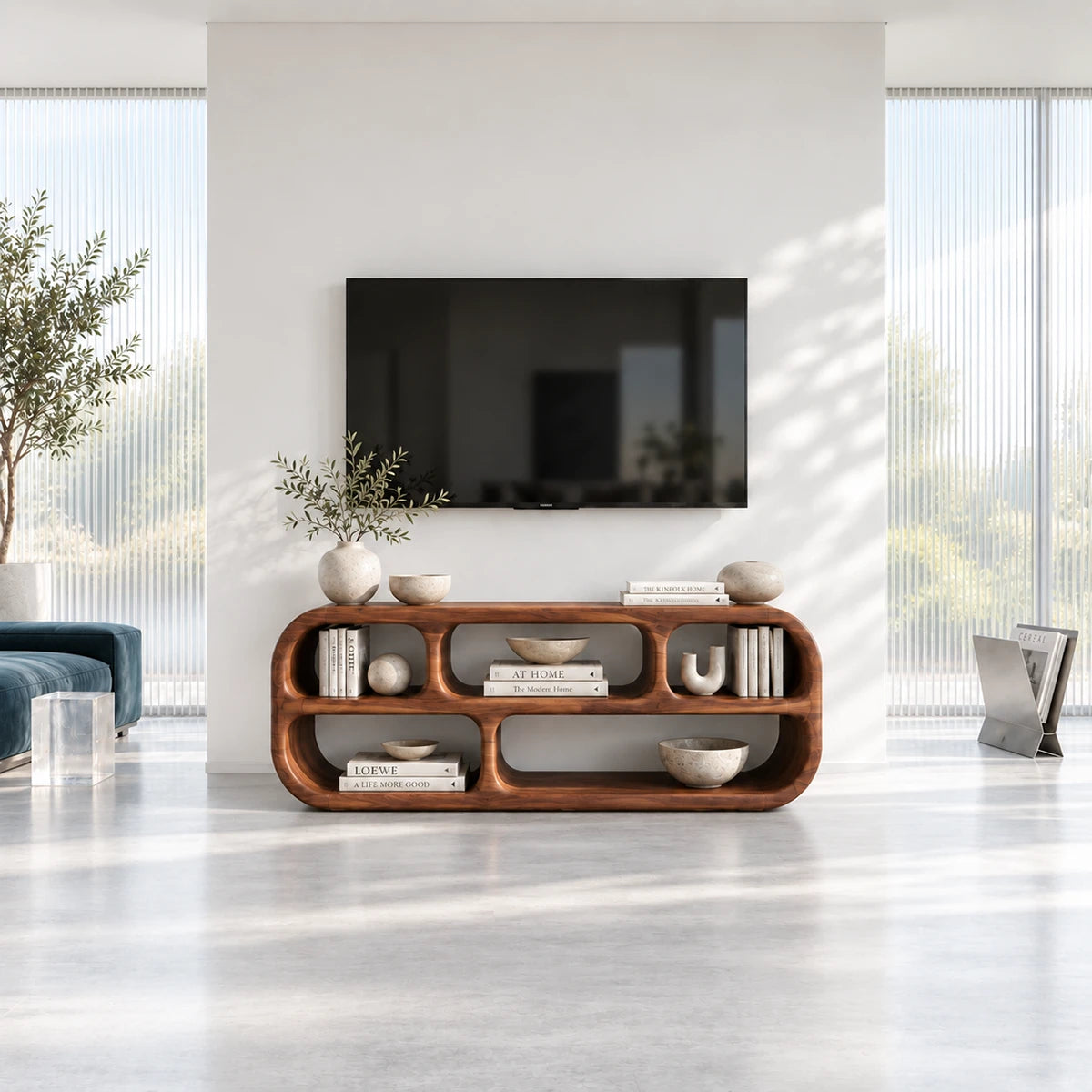Curved TV console in solid wood with open compartments and a sculptural silhouette
