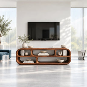 Sculptural TV stand in solid wood with rounded open shelves and low modern profile
