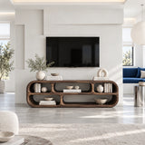 Designer media stand in solid wood with rounded geometry and shelf storage details
