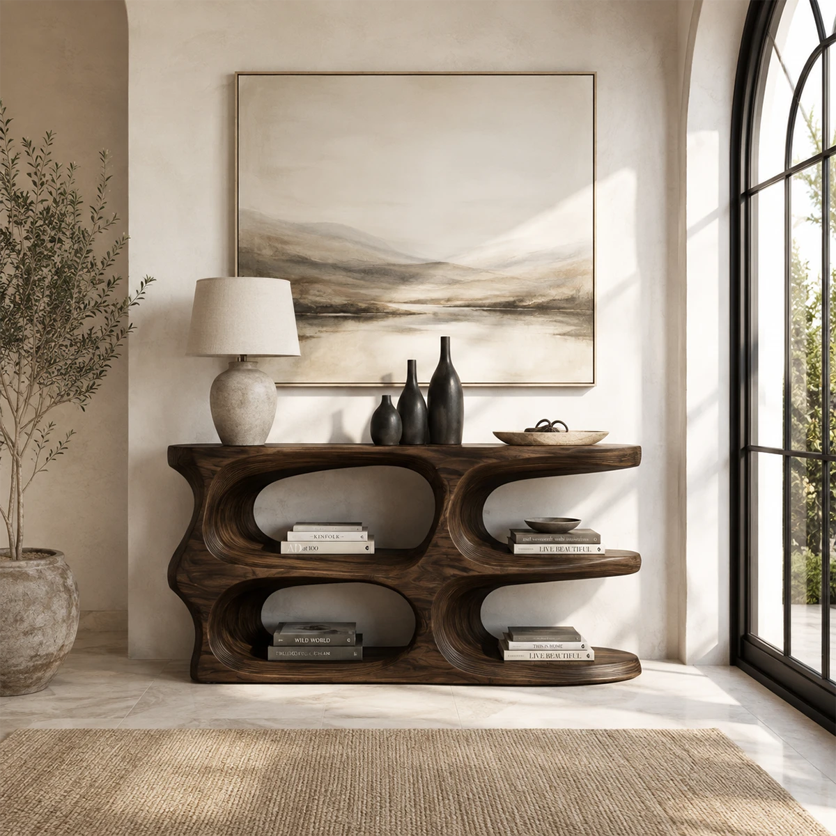 Sculptural console table with four open niches and a dark wood tone finish indoors