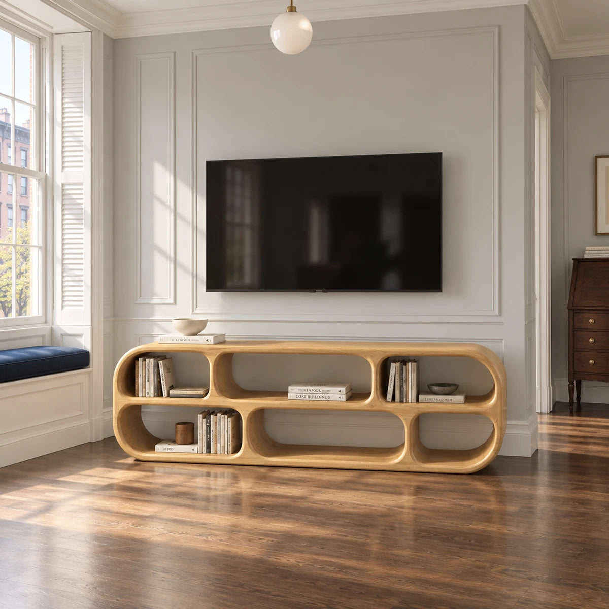 Streamlined television stand in natural solid wood with shelf space and rounded ends