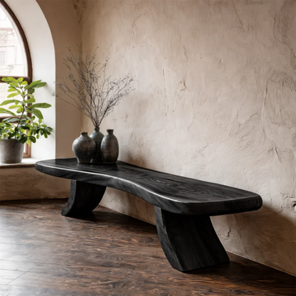 Functional entryway seating bench designed with curved geometry and black tone finish