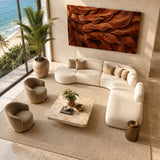 Modern wall art with sweeping carved contours brings depth to a bright contemporary room