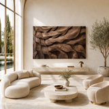 Statement wall panel with sculpted layers introduces texture to a calm minimalist interior
