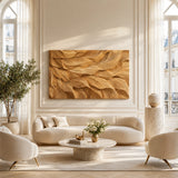 Carved relief wall art with fluid forms creates a dramatic centerpiece in an open lounge