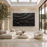 Decorative wall sculpture with layered contours adds dimension to a refined living space