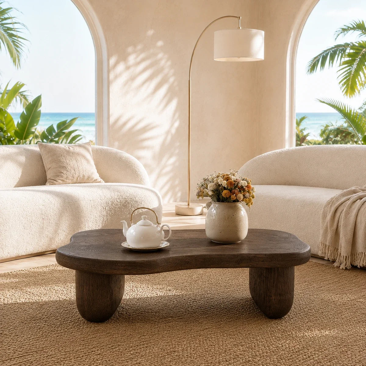 Low profile coffee table with rounded edges and dark wood tone finish for living rooms