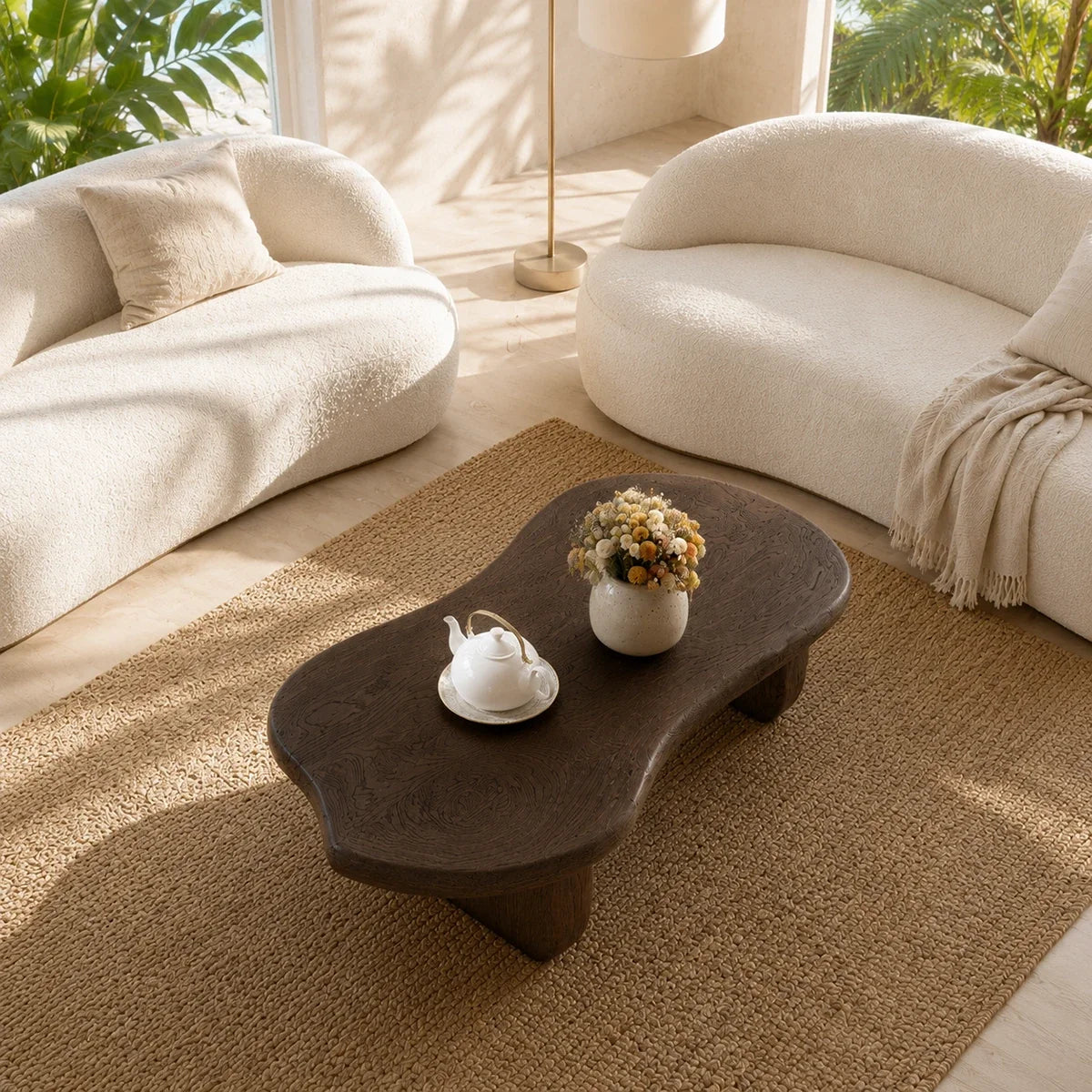 Modern coffee table with visible grain and deep wood tone finish in a serene lounge