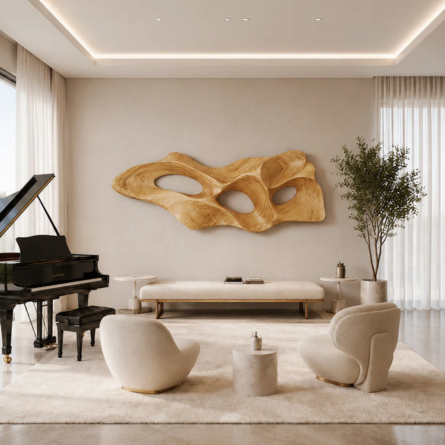 Abstract wall sculpture with organic cutouts creates a bold focal point in modern rooms