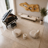 Statement wall sculpture with open shapes creates visual rhythm in a spacious interior