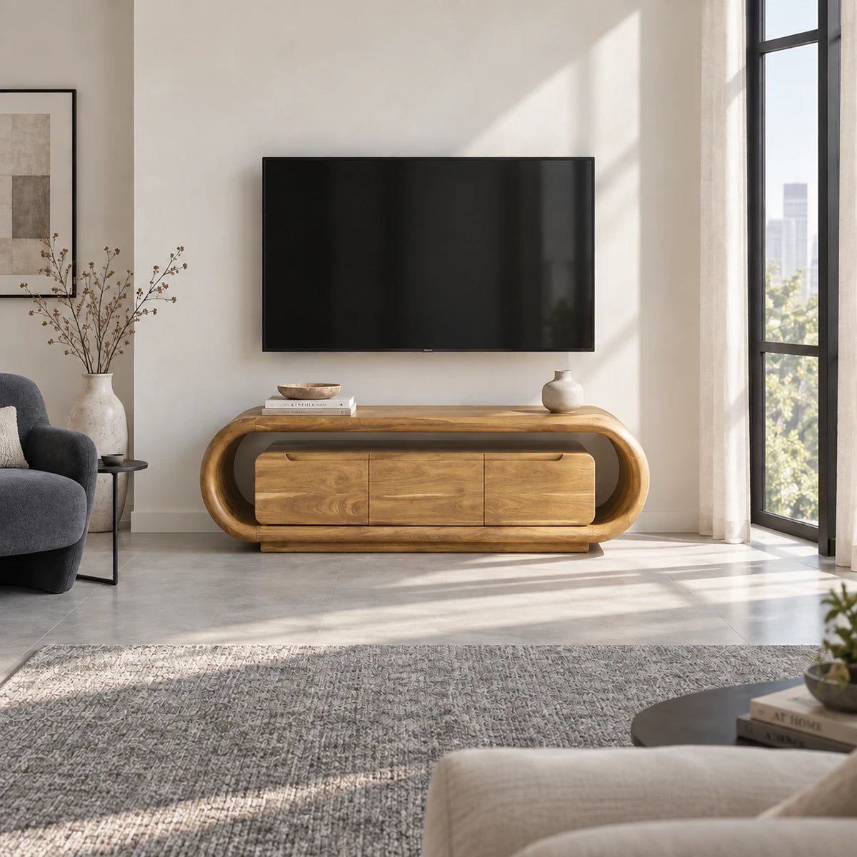 Architectural TV cabinet in solid wood with rounded sides and centered storage space
