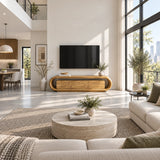 Curved media console in solid wood with concealed storage and sculptural sides detail
