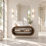 Clean lined vanity unit in natural solid wood with open shelf and curved outer frame
