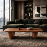 Low profile coffee table with broad surface and warm brown finish for modern decor