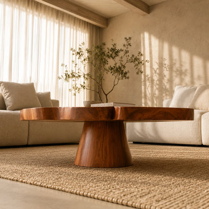 Modern living room coffee table with petal shaped top and centered pedestal base