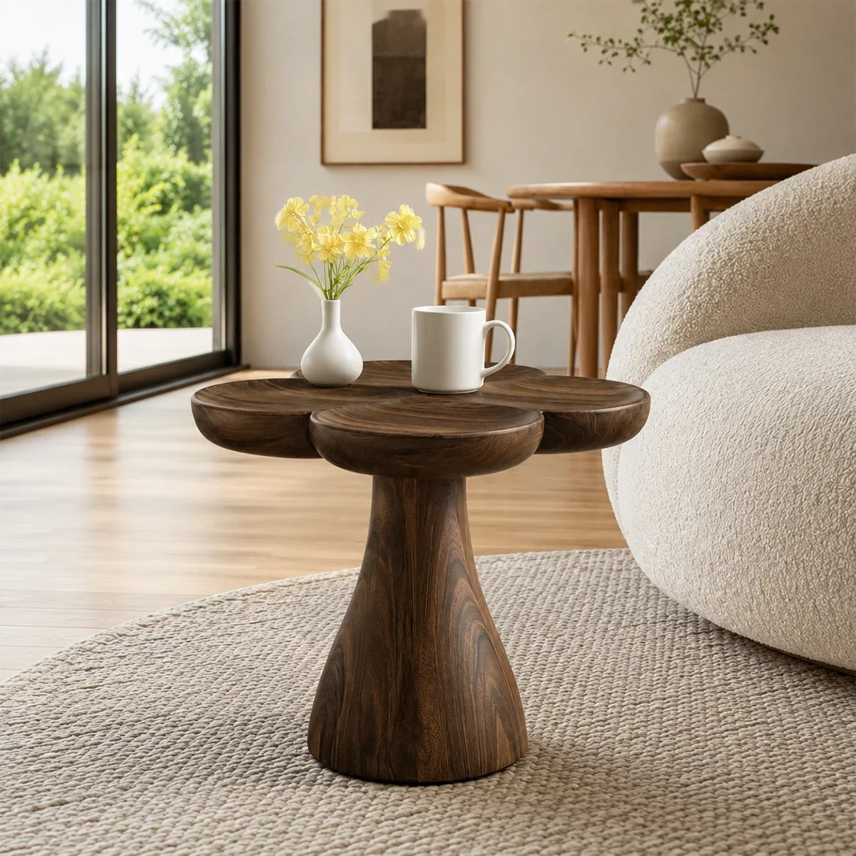 Accent end table featuring a flower shaped top and tapered pedestal base for home decor