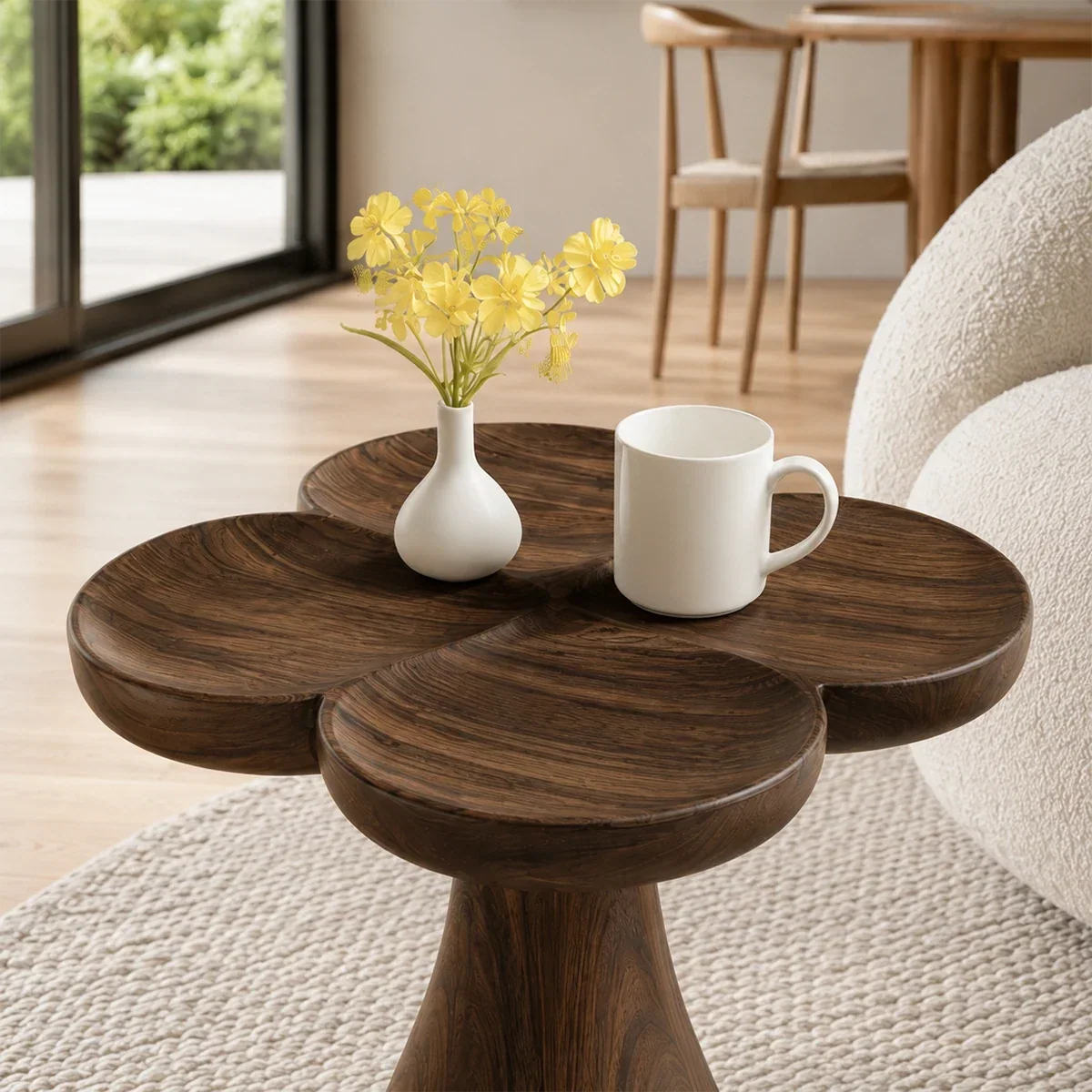 Designer side table with soft organic edges and visible grain in a refined living interior