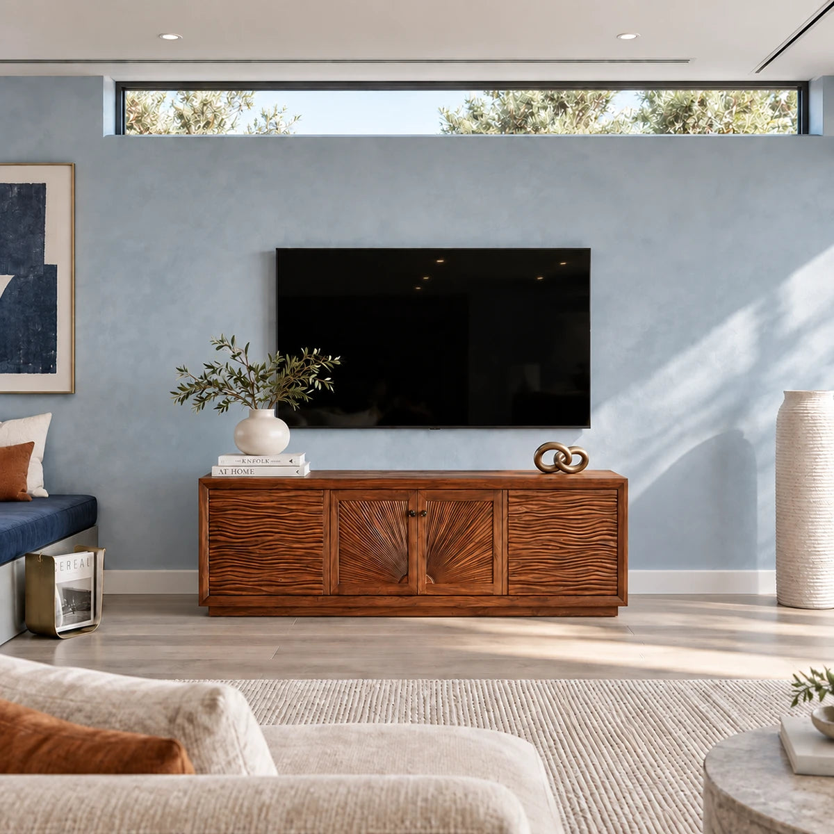 Contemporary TV stand in solid wood with carved panel texture and clean geometry
