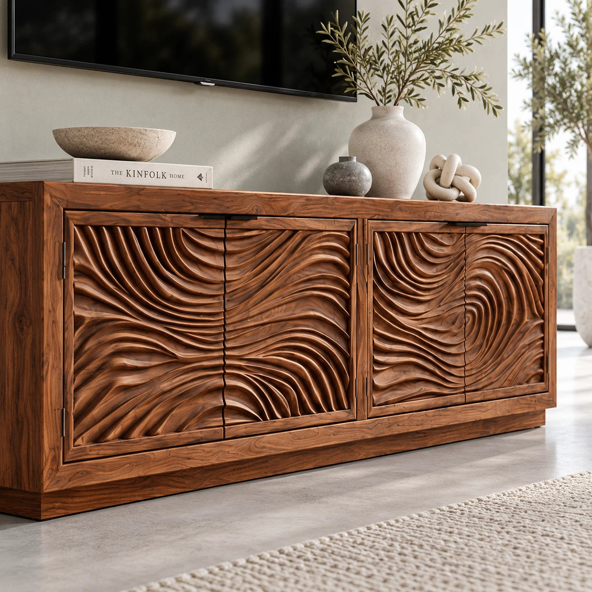Low profile TV console in solid wood with carved door texture and streamlined storage
