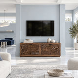 Designer entertainment unit in solid wood with carved ripple panels and sleek proportions
