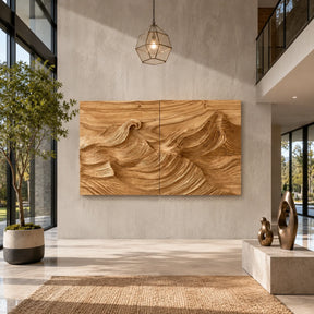 Carved landscape wall art with rolling relief adds depth to a bright modern interior