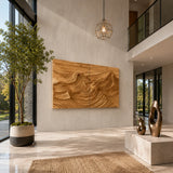 Wide relief wall panel with carved ridges brings texture to a contemporary interior