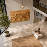 Flowing carved lines shape this wall sculpture into a calm statement for modern rooms