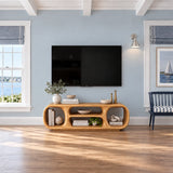 Streamlined modern TV stand in natural solid wood with rounded shelf openings below