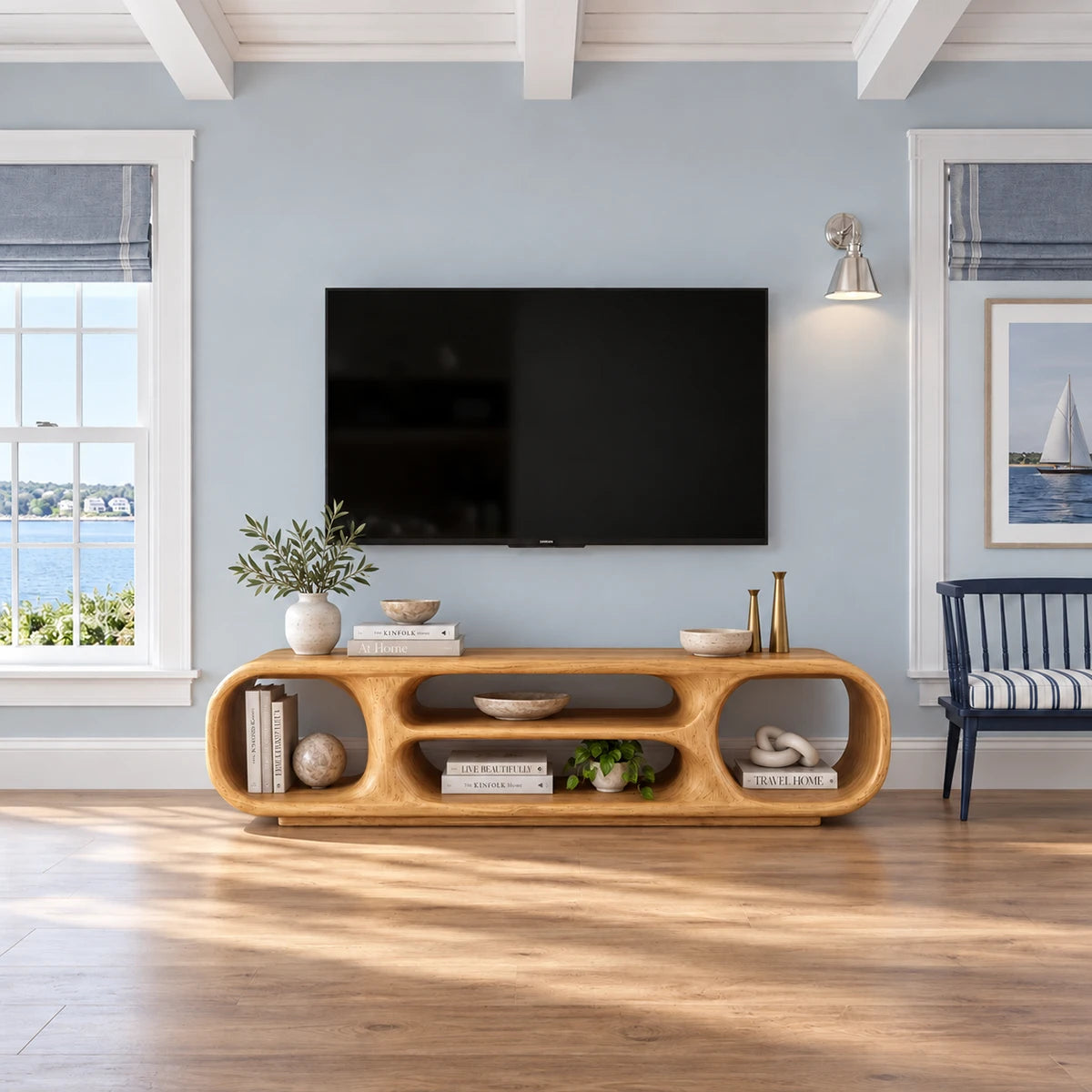 Rounded natural solid wood TV stand with open cubbies and a smooth low profile design