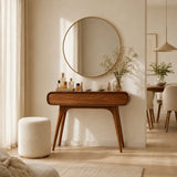 Vanity desk with curved edges and sleek drawer storage for a calm contemporary bedroom