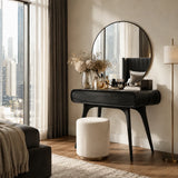 Contemporary makeup vanity showcases rounded corners and warm wood tone in an airy room