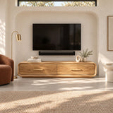 Architectural media console in solid wood with broad drawers and a sculpted outer frame
