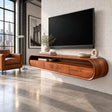 Floating TV stand in natural solid wood with rounded frame and open shelf storage