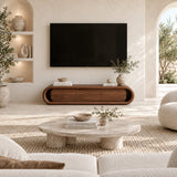 Modern entertainment unit with rounded details and concealed storage for electronics