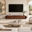 Low profile media console with soft curved edges and clean doors for a refined interior