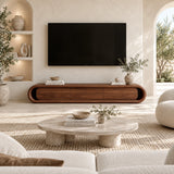 Low profile media console with soft curved edges and clean doors for a refined interior