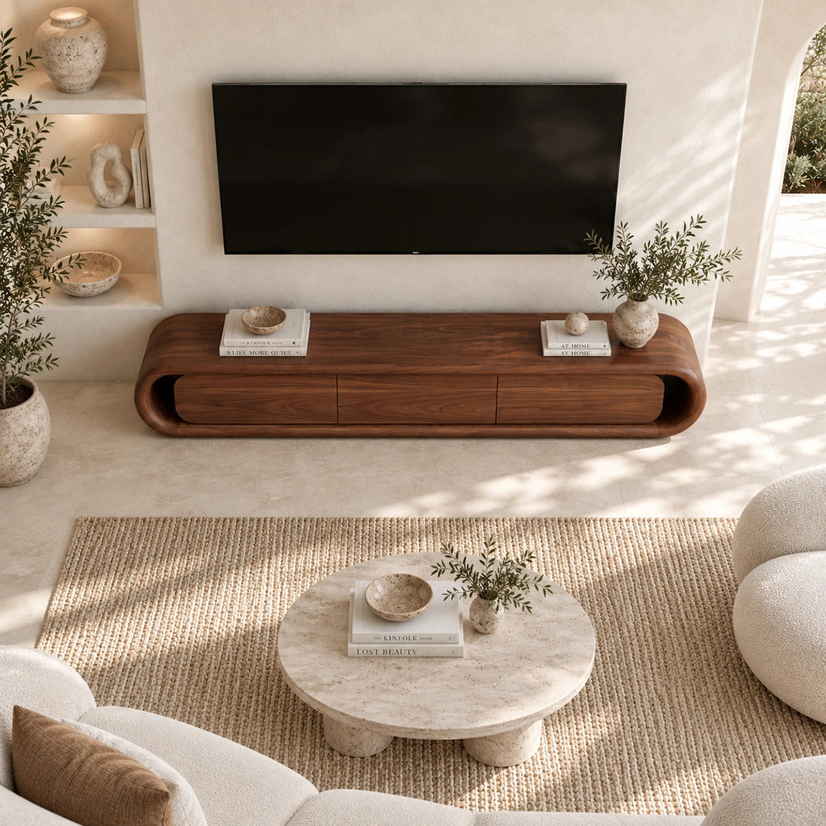 Minimalist media cabinet with rounded corners and concealed storage for serene interiors
