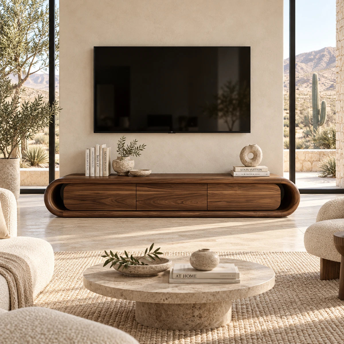 Statement TV console with a continuous curved frame creates a clean focal point below TV