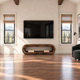 Designer television stand with clean open shelving and softly curved architectural form