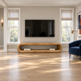 Living room TV stand in natural solid wood with low form and generous open shelf space