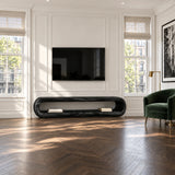 Wide entertainment console with rounded corners and open storage for a modern media setup
