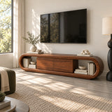 Sculptural entertainment center in solid wood with rounded sides and book display

