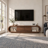 Elegant entertainment console in solid wood with rounded silhouette and shelving
