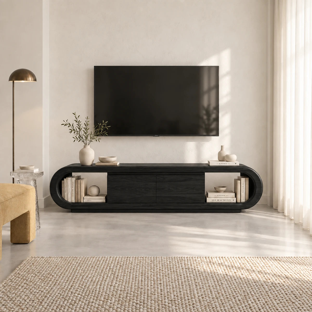 Designer media stand in solid wood with curved edges and central door storage unit
