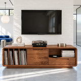 A rounded media cabinet in solid wood with vinyl storage, drawers, and shelf space
